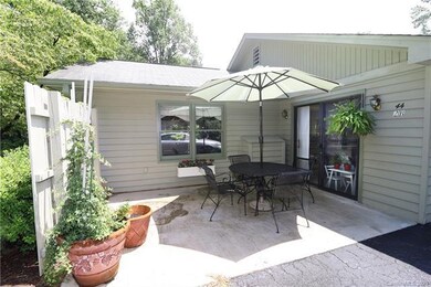 Patio around the back of the end unit condo for re