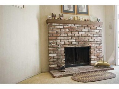 Fireplace located in family room/dining area.