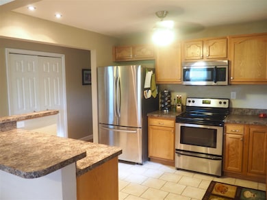 Kitchen was updated and walls removed to make OPEN