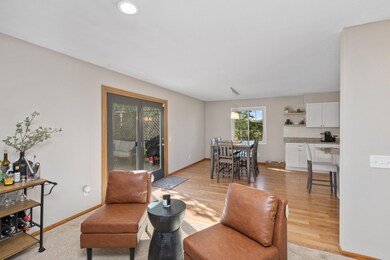 The dinette boasts trending pendant lighting and access to the spacious deck.