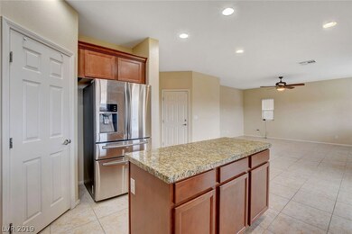 Kitchen with walk in pantry opens to large family