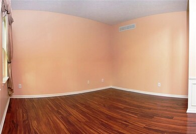 Check out the Laminate Hardwood Floors.  Light and bright!