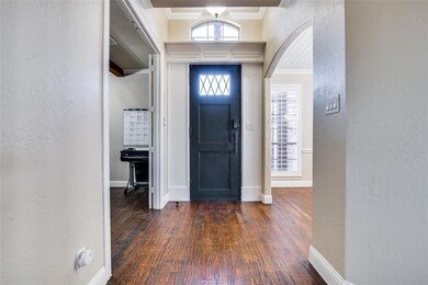 VIew looking at the entry study to the left and dining room to the right.