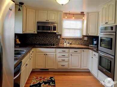 Kitchen featuring double ovens