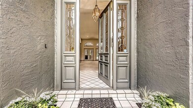 Impressive front door with leaded beveled glass.