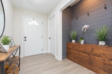 Entryway with door to Garage