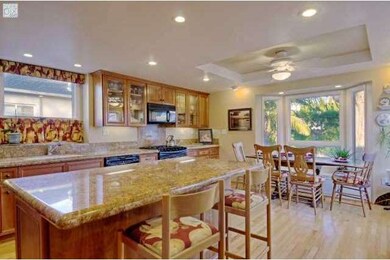 Gourmet kitchen with breakfast area.