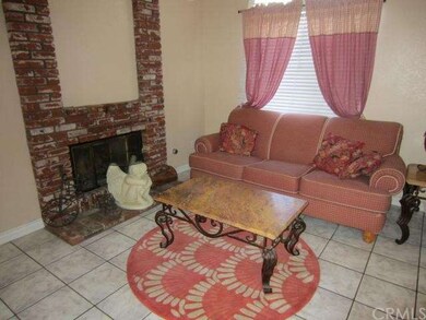 Living Room with Brick Fireplace