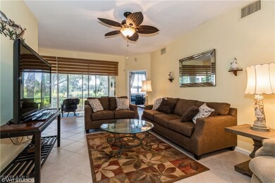 Living area with a sunroom, visible vents, a ceili