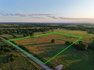 Aerial view at dusk of a view of countryside and property parcel outlined