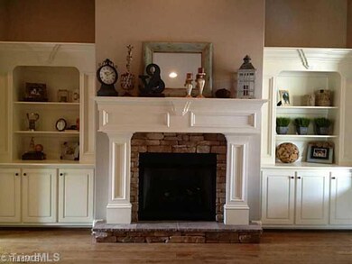 Den/Family/Great Room. Great Room Fireplace with Built-in Shelving and Cabinetry