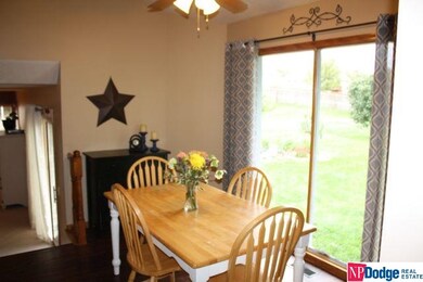 Great natural light and view of the outdoors makes this eat in kitchen area enjoyable.