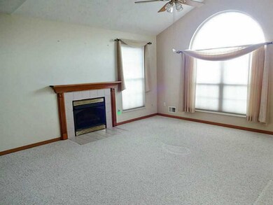 Living Room. Cathedral ceiling and fan along with a gas fireplace will help you feel right at home in this 17x13 Living Room.