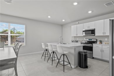 Kitchen featuring stainless steel appliances, an i