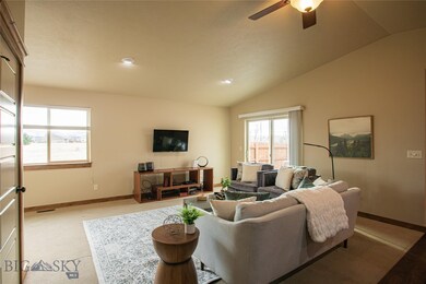 Living room with open space views and patio doors.