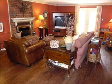 Masonry fireplace in super large Great Room. Frenc