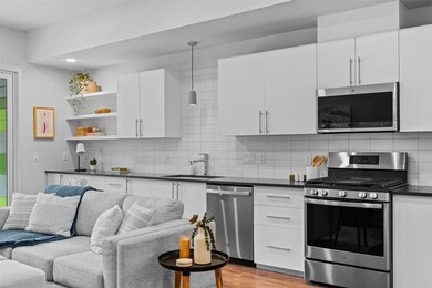 Kitchen featuring appliances with stainless steel