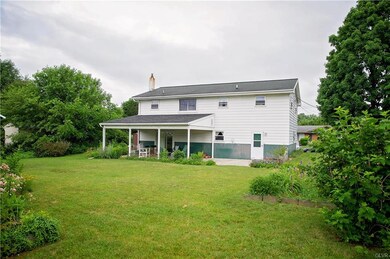 Large patio area, partially covered