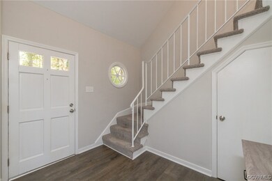 Open and inviting 2 story foyer with loft above an