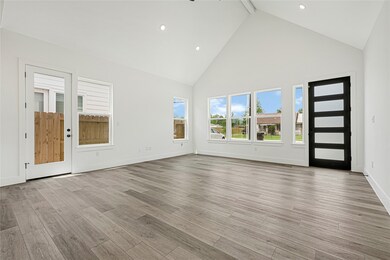 living room and access to the yard on the left.