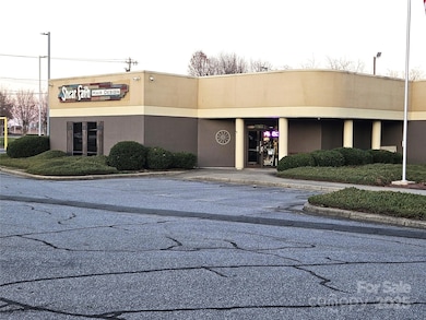 Adjoins this property 