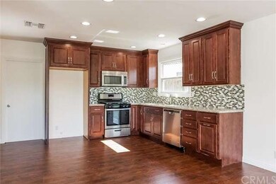 Beautifully remodeled kitchen complete with soft c