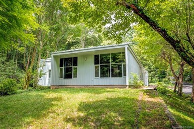 Side view of house with level side yard.