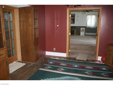Enter the home into the dining room with built in'