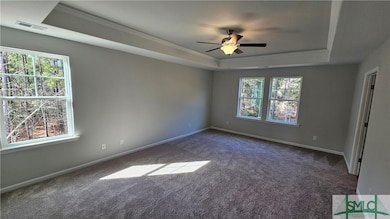 Primary Bedroom with Tray Ceiling