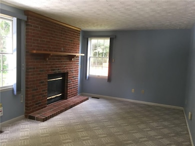 Family room with gas fireplace.