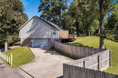 Alley, shared by one neighbor, leads to a large dr