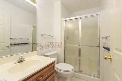 fully handicap accessible bathroom including doorw