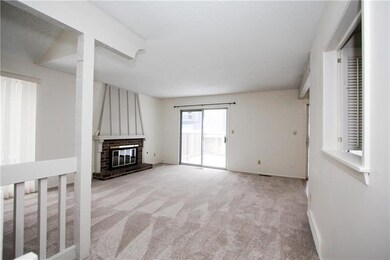 Freshly painted Living Room with fireplace