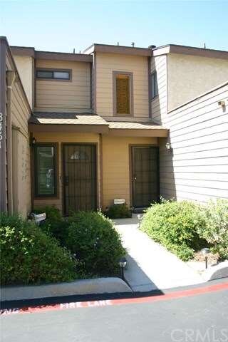 Landscaped and lighted entry. Your door is on the 
