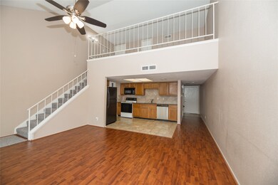 Living/dining room with wood-look laminate floorin