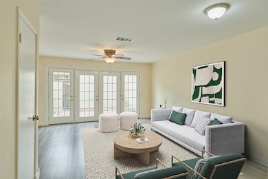 This bright, contemporary living 
room features l