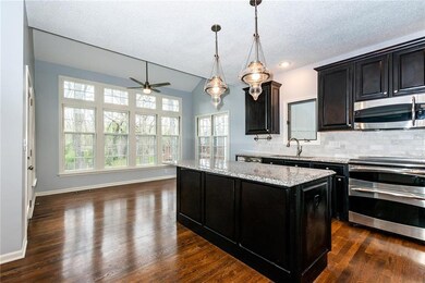 Plenty of windows in kitchen for natural sunlight 