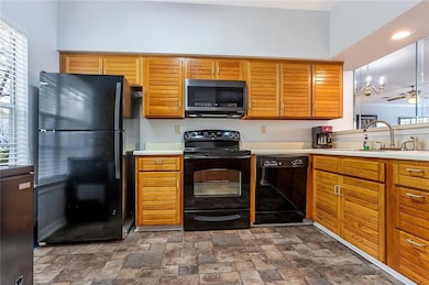 KITCHEN ALSO HAS CABINETS ON OTHER SIDE