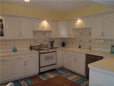 Kitchen. Tons of cabinets and counter space!  Seller loves the Jenn-Air range!