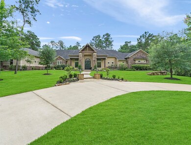 The horseshoe driveway ushers you to the stately entrance