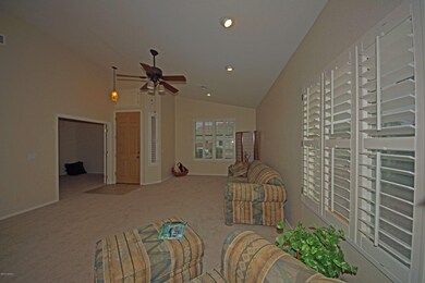 Living area looking to entry way