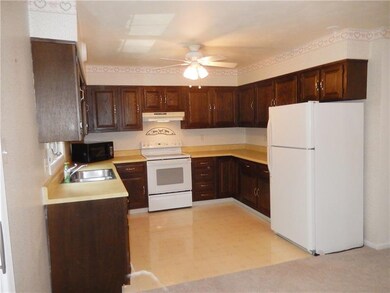 Kitchen is complete with dishwasher, disposal, ele