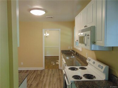 Kitchen has room for a table.