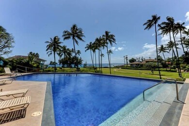 Lounging by the large pool listening to the waves