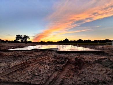 Current state 11-11-25. View looking West over rear of slab.