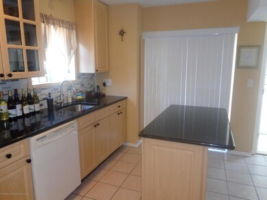 KITCHEN WITH SLIDERS TO DECK