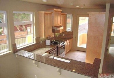 The kitchen view from the dining area.  The counte