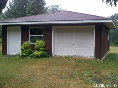 Exterior Front Outbuilding to store cars and other