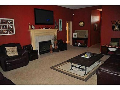 Exterior Front. The grand fireplace, ceiling fan a