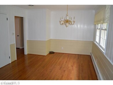 Dining Room. Large dining area with wood flooring.